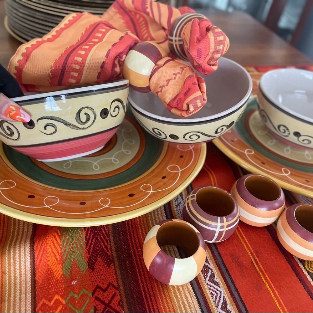 plates, ceramic soup tureens and decorative wooden napkin holders